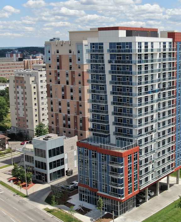 an aerial view of an apartment building in the city