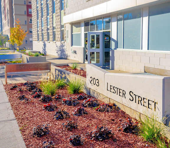 a street sign forlee street in front of a building