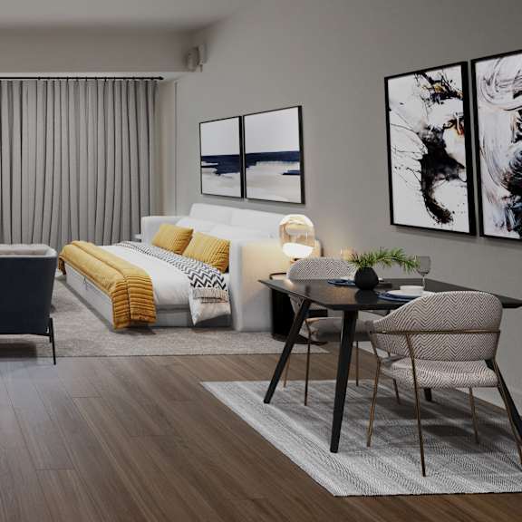 A modern bedroom with a large bed, a chair, and a dining table.