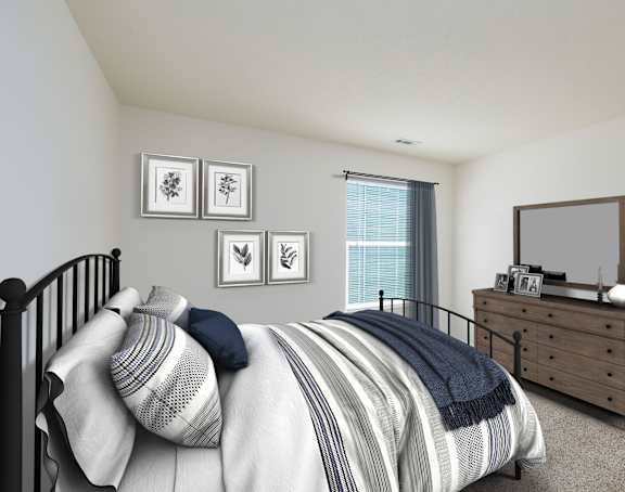 A bedroom with a bed, dresser, and mirror.