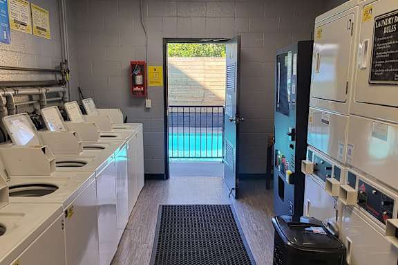 a kitchen with a pool and a door in the back