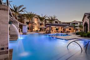 a swimming pool at night at the resort at longacre