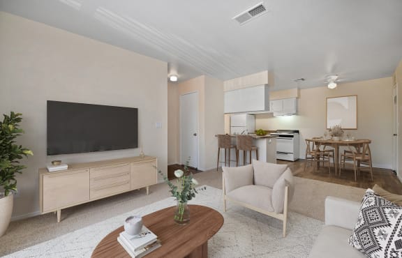 a living room with a white couch and a coffee table