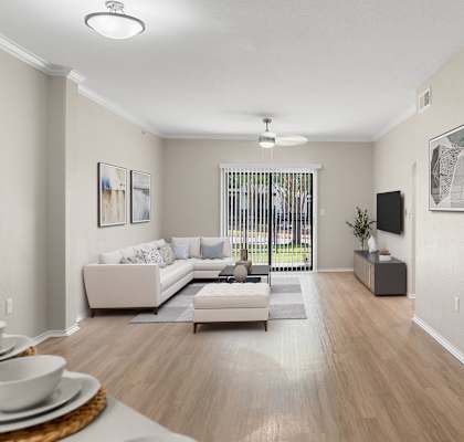 an open living room with a couch and a table