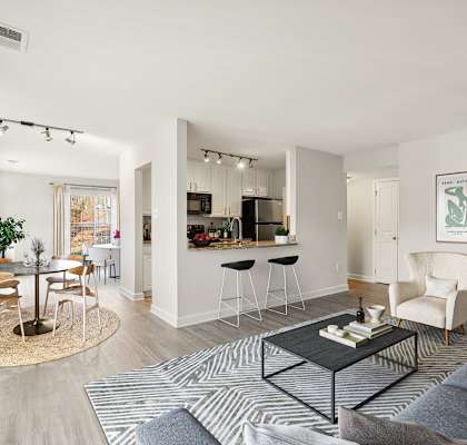 a living room with a couch and a coffee table  at Ellicott Grove, Ellicott City, MD 21043