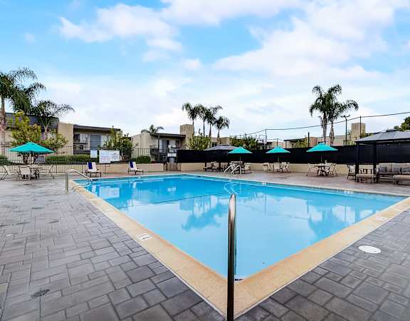 pool area at the enclave at woodbridge apartments in sugar land, tx