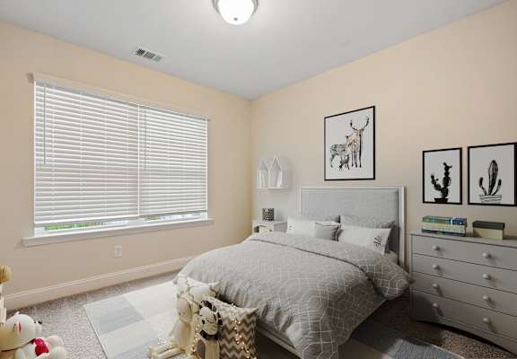 a bedroom with a bed and a dresser and a window
