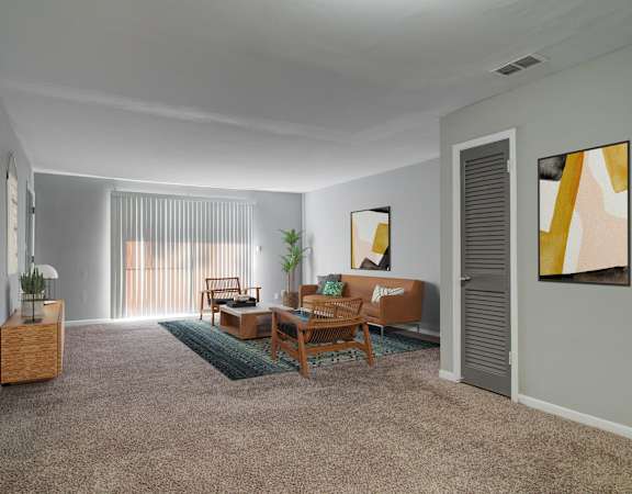 a living room with gray walls and a carpeted floor