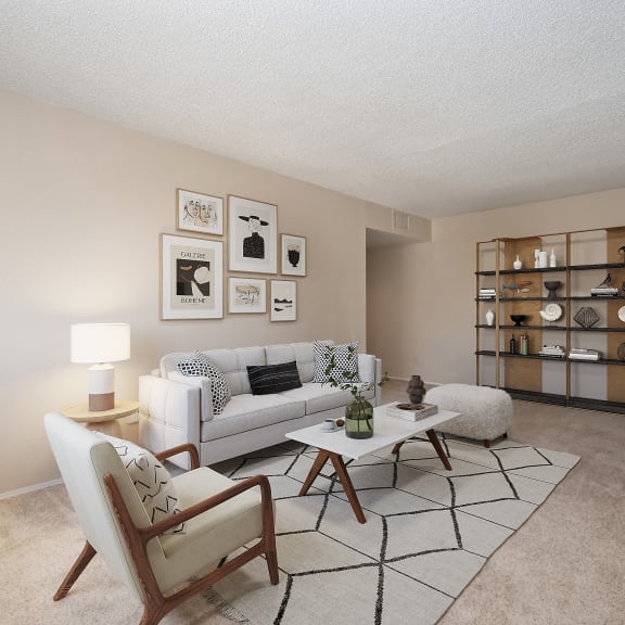 an open living room with a couch and a table