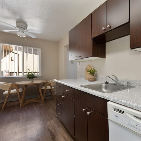 a laundry room with a washer and dryer in a house