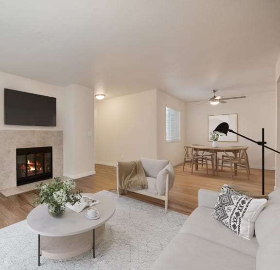 Kitchen with stainless steel appliances and white cabinets at Rush River Apartments, California