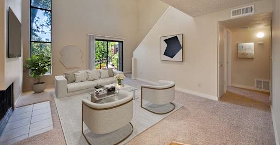 a living room with two couches and a coffee table at Fountains of Fair Oaks, Fair Oaks