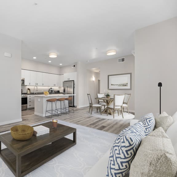 a living room with a couch and a coffee table at Sierra Gateway Apartments, Rocklin, CA