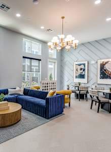 Library with Fireside Seating at Cedar Heights Luxury Apartments in Austin, TX