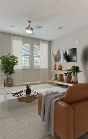 a living room and dining room with a couch and a table