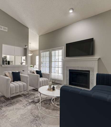 an empty living room with a large window and wood flooring at The Manhattan Apartments, Dallas, TX, 75252