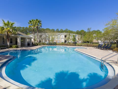 Swimming Pool with clubhouse in the background