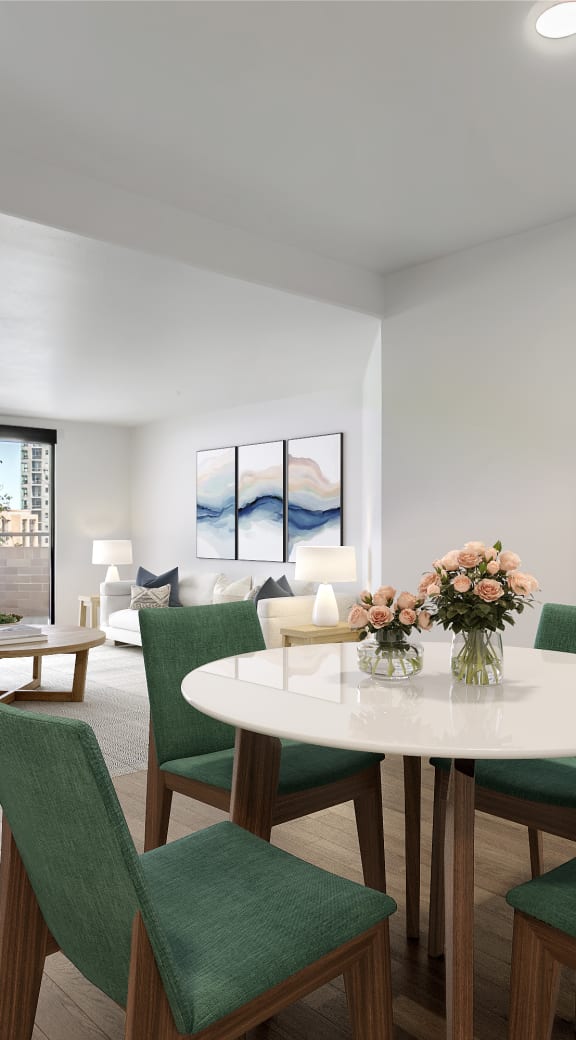 an updated kitchen with stainless steel appliances and white counter tops