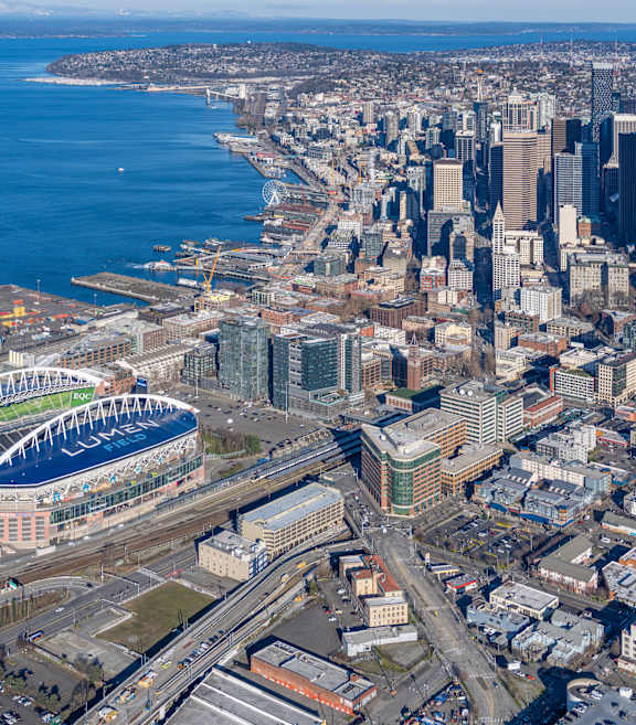 an aerial view of the city and the navy yard and stadium