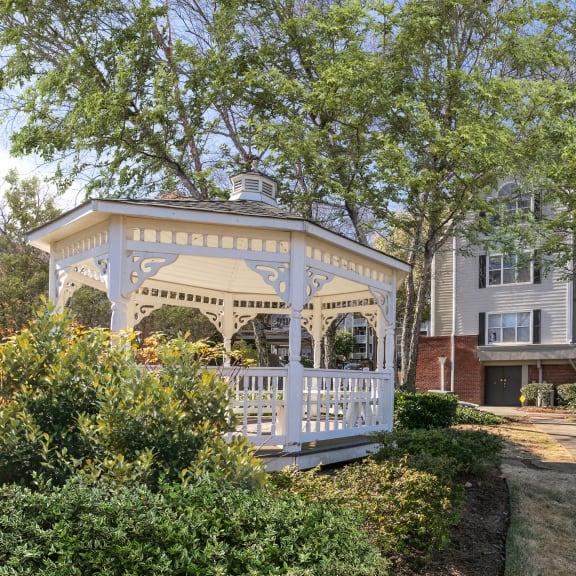 a gazebo in front of an apartment building  at Briarcliff Apartments in North Druid Hills, GA