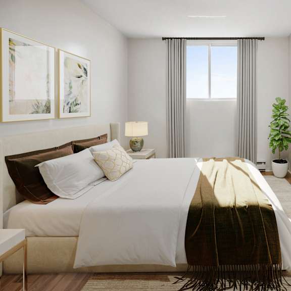 A bedroom with a large bed and a painting on the wall.