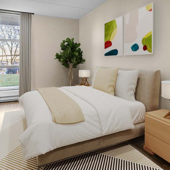 A bedroom with a large bed and a painting on the wall.