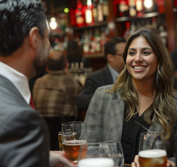 people sitting at a bar with drinks  at Nineteen North, New York 14202