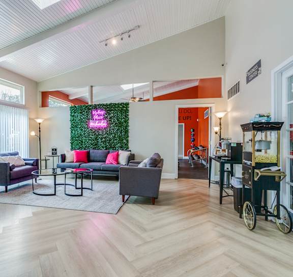 a living room with couches and a coffee table