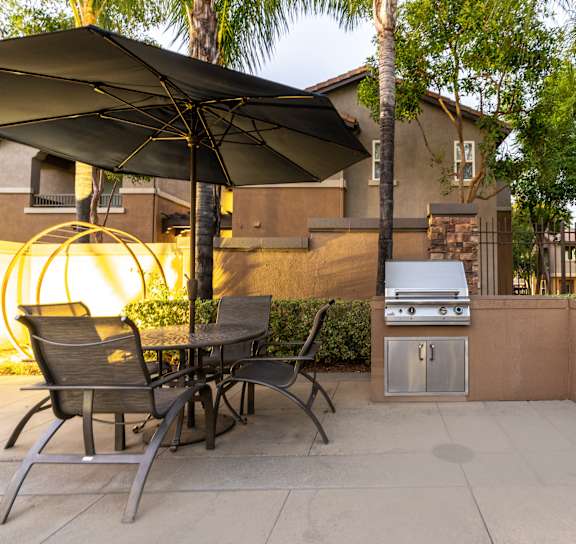 patio with still fireplace at Sonoma at Mapleton Apartments, West Murrieta California