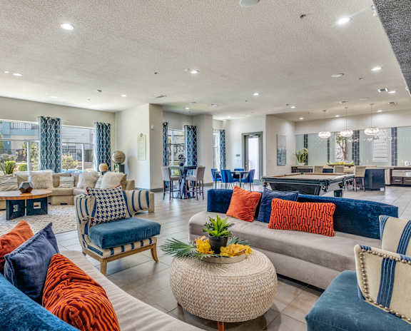 A modern apartment complex with a well-maintained courtyard.