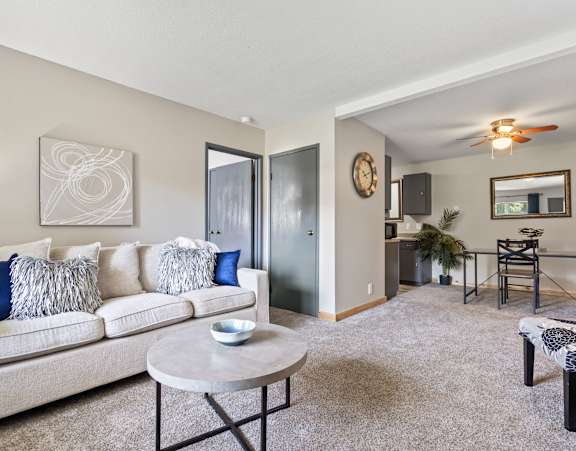 a living room with a couch and a table