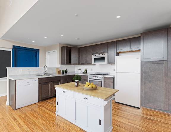 a kitchen with white cabinets and white appliances and a wooden counter top