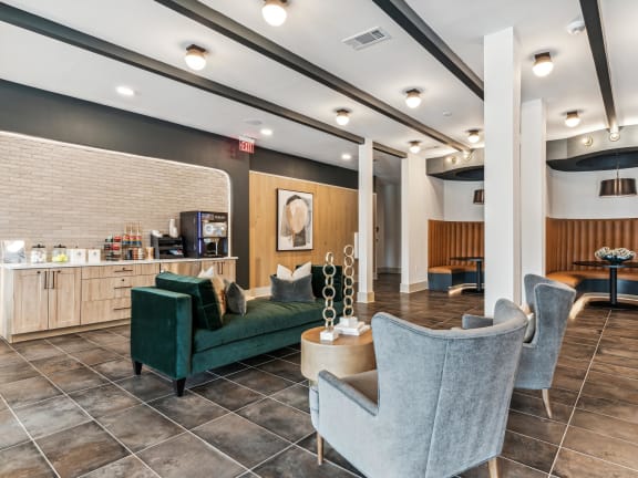 a lobby with couches and chairs and a coffee table