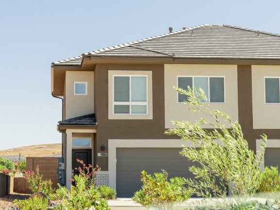 Exterior View of Desert Sage Townhomes in Hurricane Utah with double car garage
