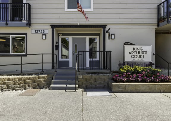 a building with a sign that reads king archives court  at King Arthurs Court, Seattle, WA