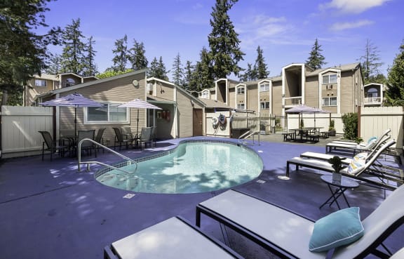 take a dip in our resort style pool  at Park 210 Apartment Homes, Washington