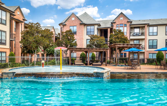 Exterior Building and Sparkling Pool at Vintage Park Apartments, Houston, TX