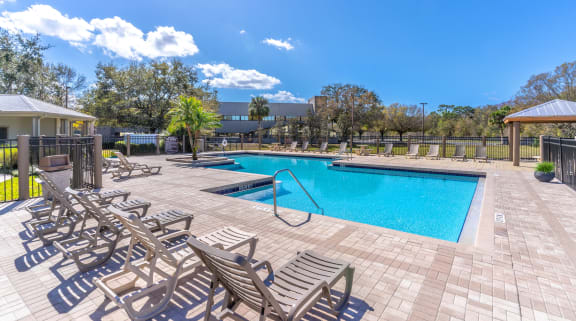 the reserve at bucklin hill pool and hot tub with chaise lounge chairs