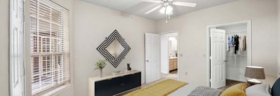 Bedroom With Ceiling Fan at The Claremont Apartment Homes, Overland Park Kansas