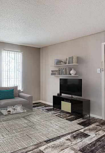 a living room with a couch and a coffee table