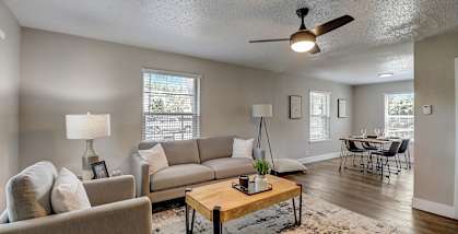 a living room with a couch and a coffee table