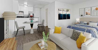 A modern living room with a white couch and a wooden coffee table.