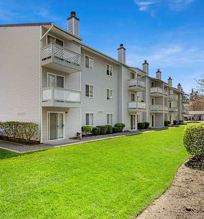 a view of the exterior of a building at Campo Basso Apartment Homes in Lynnwood, WA