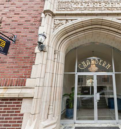the front door of the building at Charbern Apartment Homes, Seattle, WA