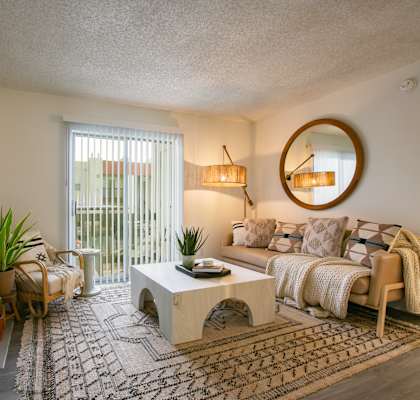 a living room with a couch and a coffee table