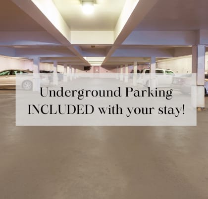 a sign in a parking garage saying underground parking included with your stay