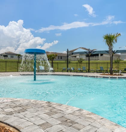 take a dip in the resort style pool at the enclave at woodbridge apartments in sugar land
