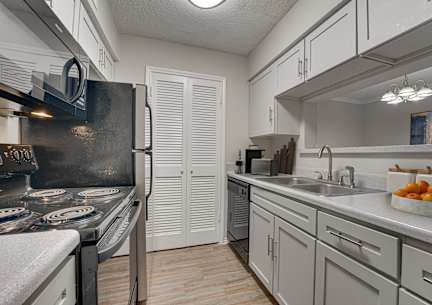 Fully equipped kitchen at Timberglen Apartments, Dallas, TX