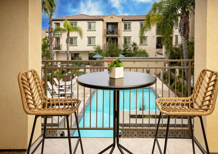 an outdoor patio with tables and umbrellas