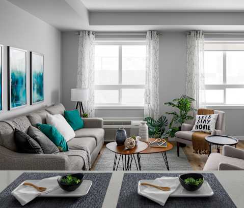 a living room with gray walls and a large window